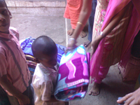 orphanage receiving the donated blanket